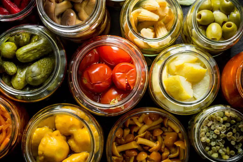 preserved and pickled vegetables in jars